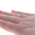 .58ctw Diamond and Emerald Band Yellow Gold